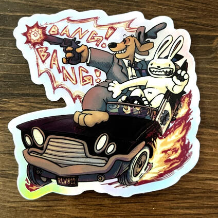 A holographic sticker of Sam and Max driving the DeSoto and shooting.